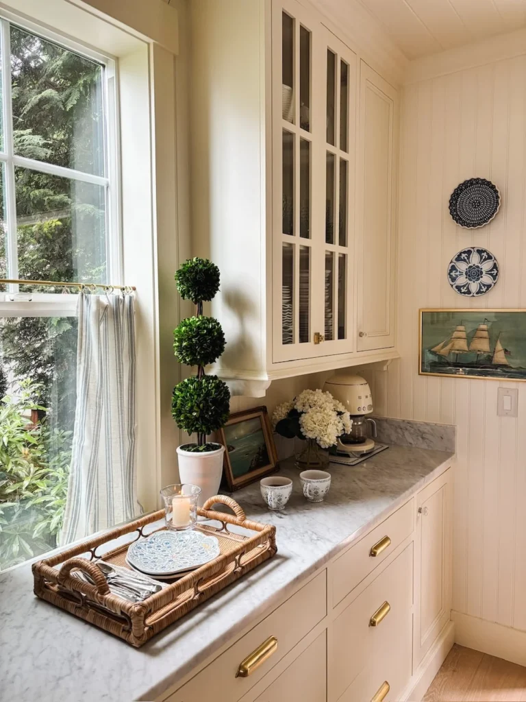Cream kitchen counter with morning light and a cozy calm feel