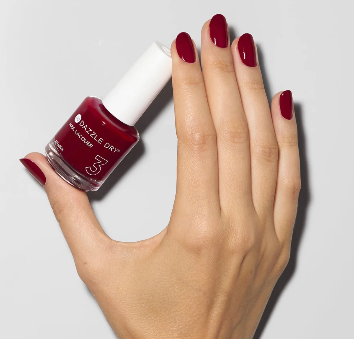 Dazzle Dry Fast Track Cherry polished toes close up