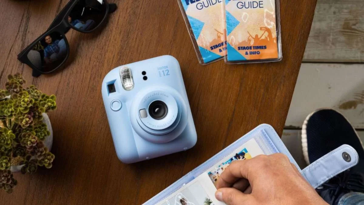 Fujifilm Instax Mini 12 instant camera with printed photo