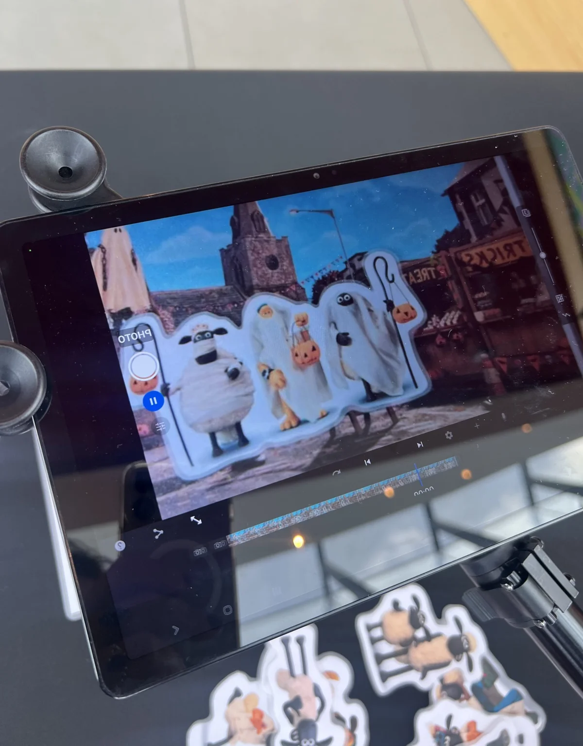 A child's tablet showing the Beast of Mossy Bottom Halloween title screen